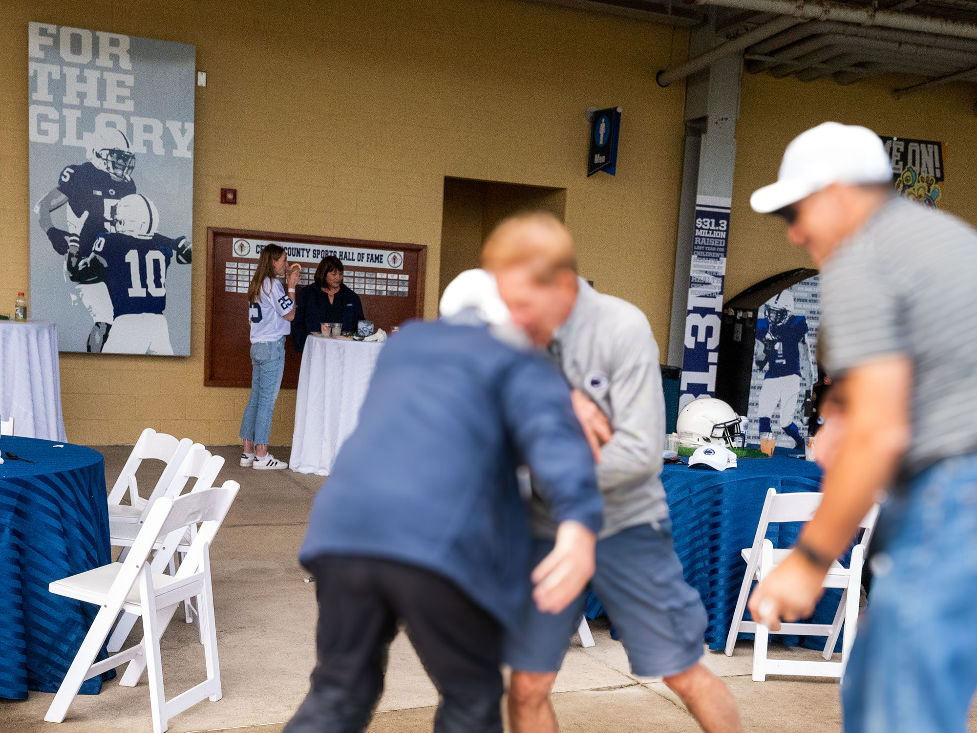tailgate-tackle Participants playing football at President's Tailgate.